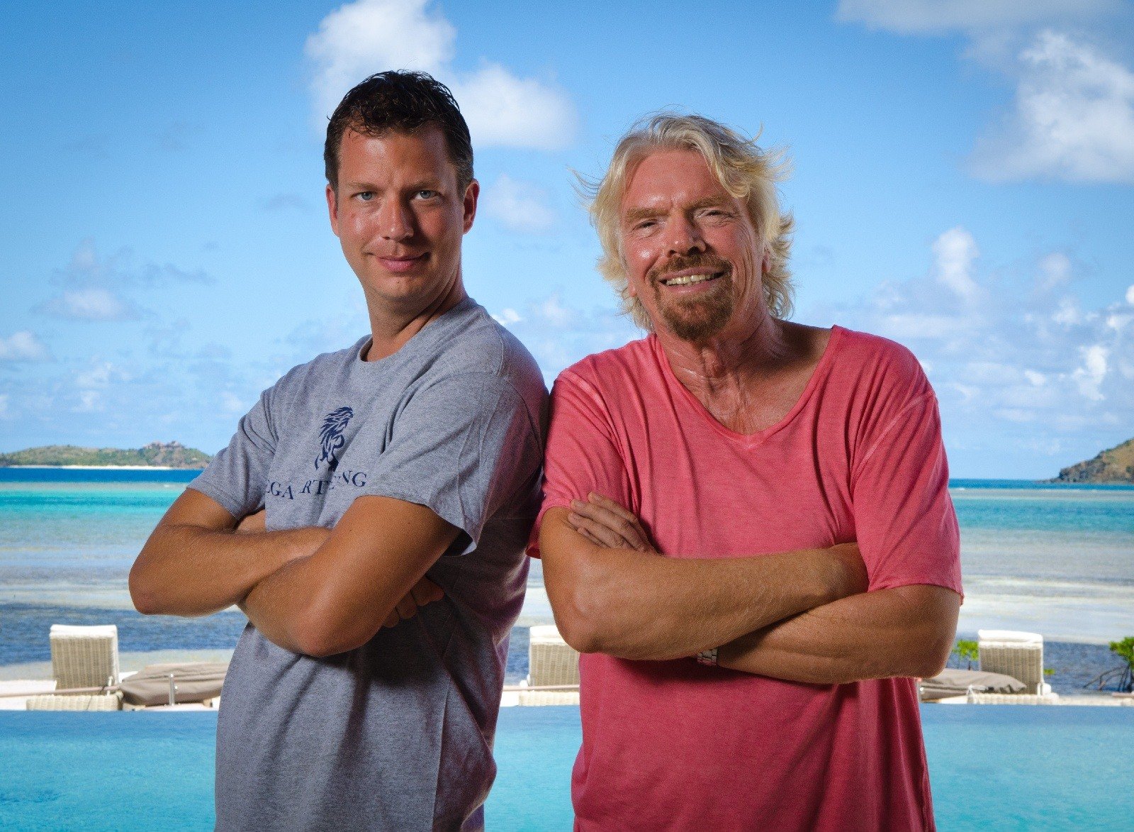 JT Foxx with a business figure on a beach