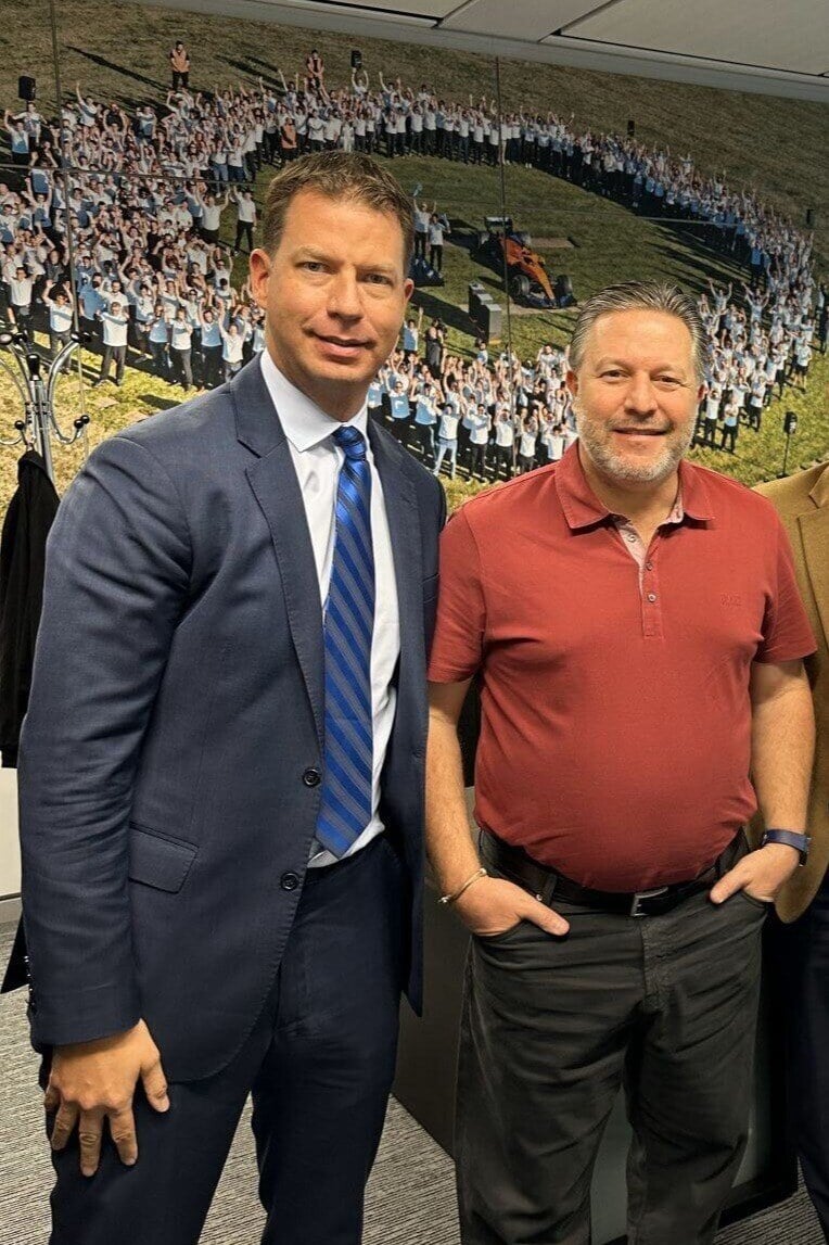 JT Foxx standing at a corporate meeting